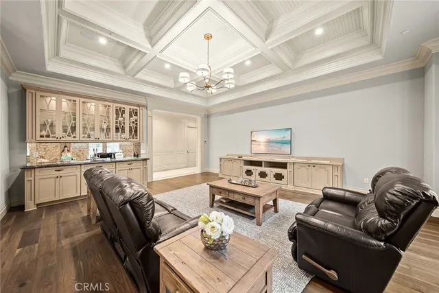 a living room with furniture or outdoor view and a chandelier