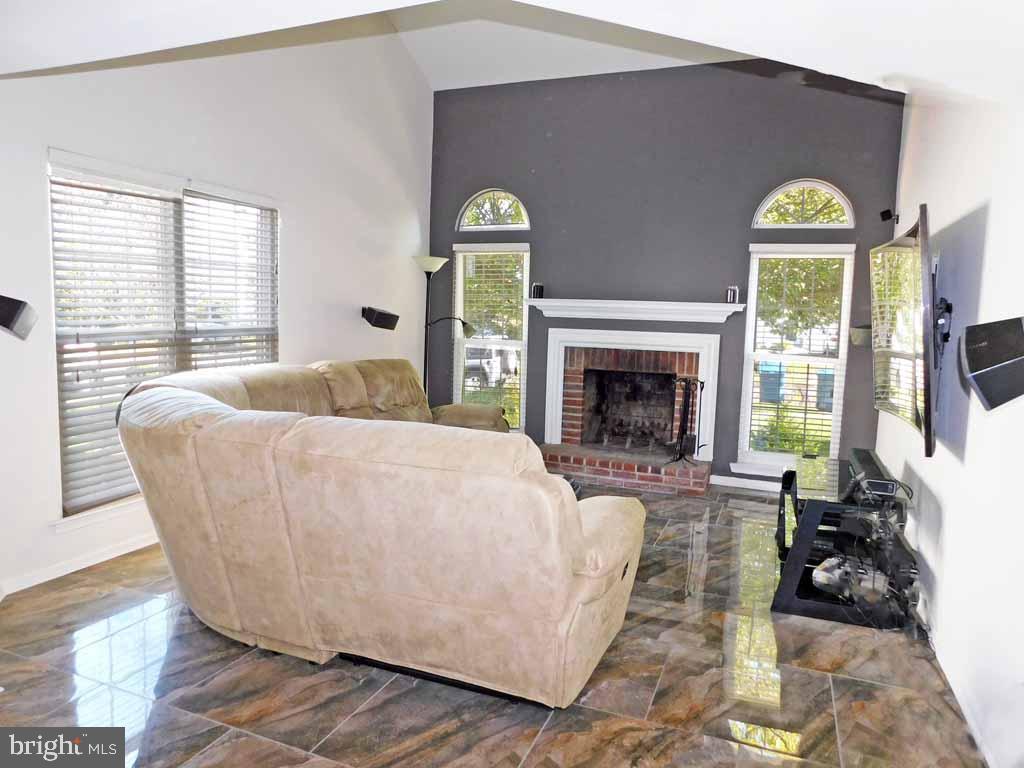 27 East Park Road Newtown, PA 18940 - Photo 5 of 27 Living room with custom tile throughout 1st fl