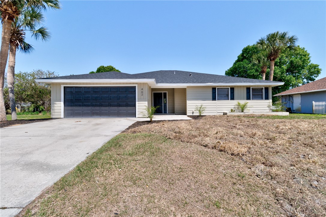 front view of a house with a yard