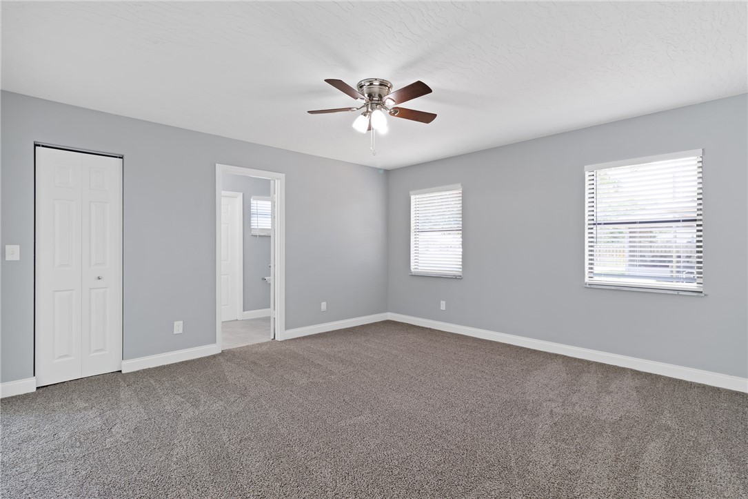 462 Watercrest Street Sebastian, FL 32958 - Photo 16 of 36 a view of an empty room with a window