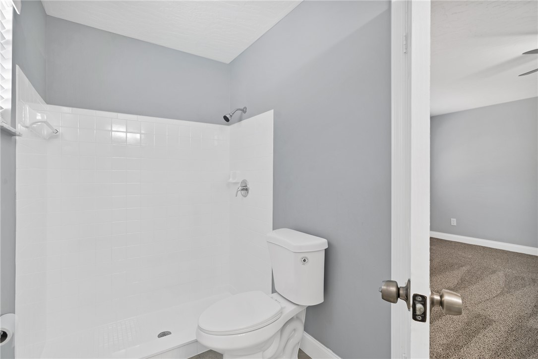 462 Watercrest Street Sebastian, FL 32958 - Photo 19 of 36 a white toilet sitting next to a bathroom sink
