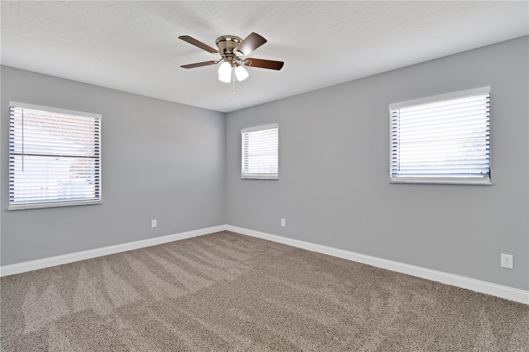 462 Watercrest Street Sebastian, FL 32958 - Photo 20 of 36 a view of an empty room with a window