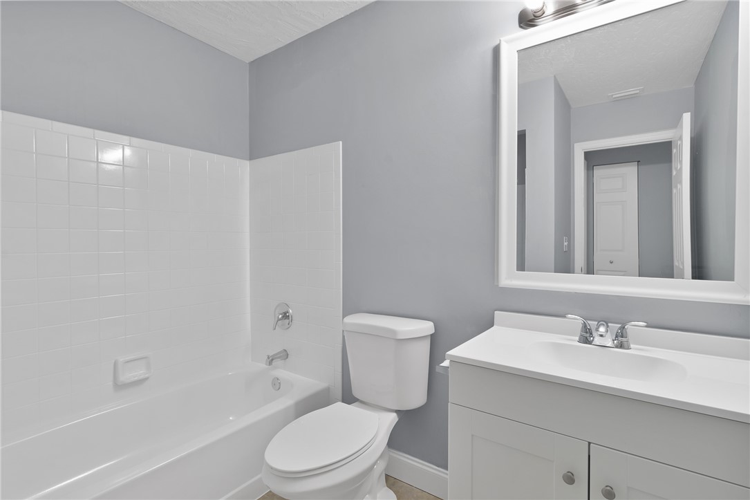 462 Watercrest Street Sebastian, FL 32958 - Photo 22 of 36 a bathroom with a sink toilet vanity and shower