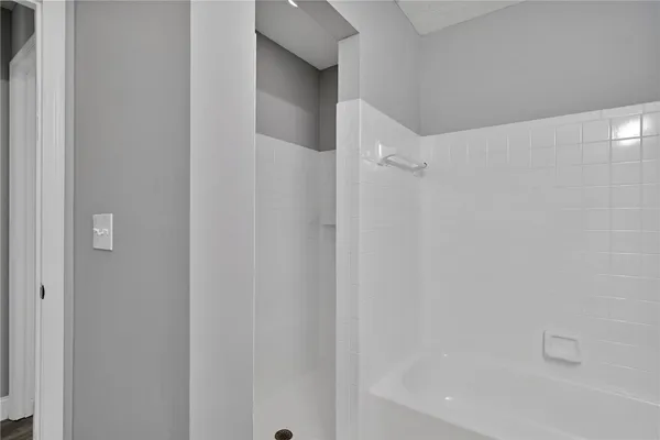 a bathroom with a bathtub