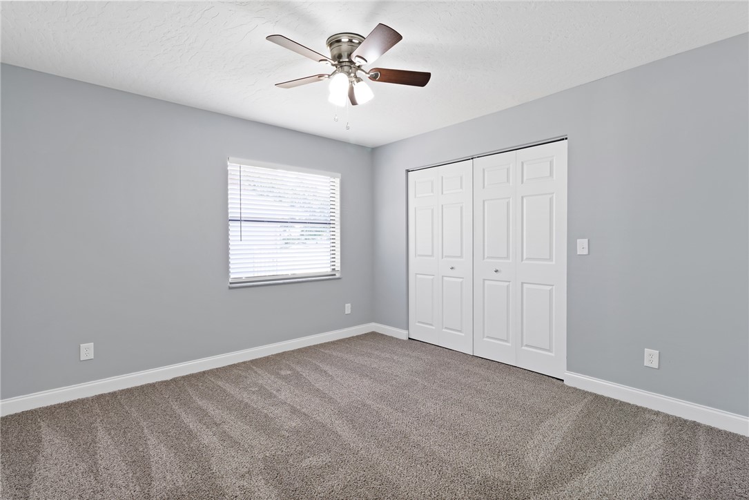 462 Watercrest Street Sebastian, FL 32958 - Photo 24 of 36 a view of an empty room with a window