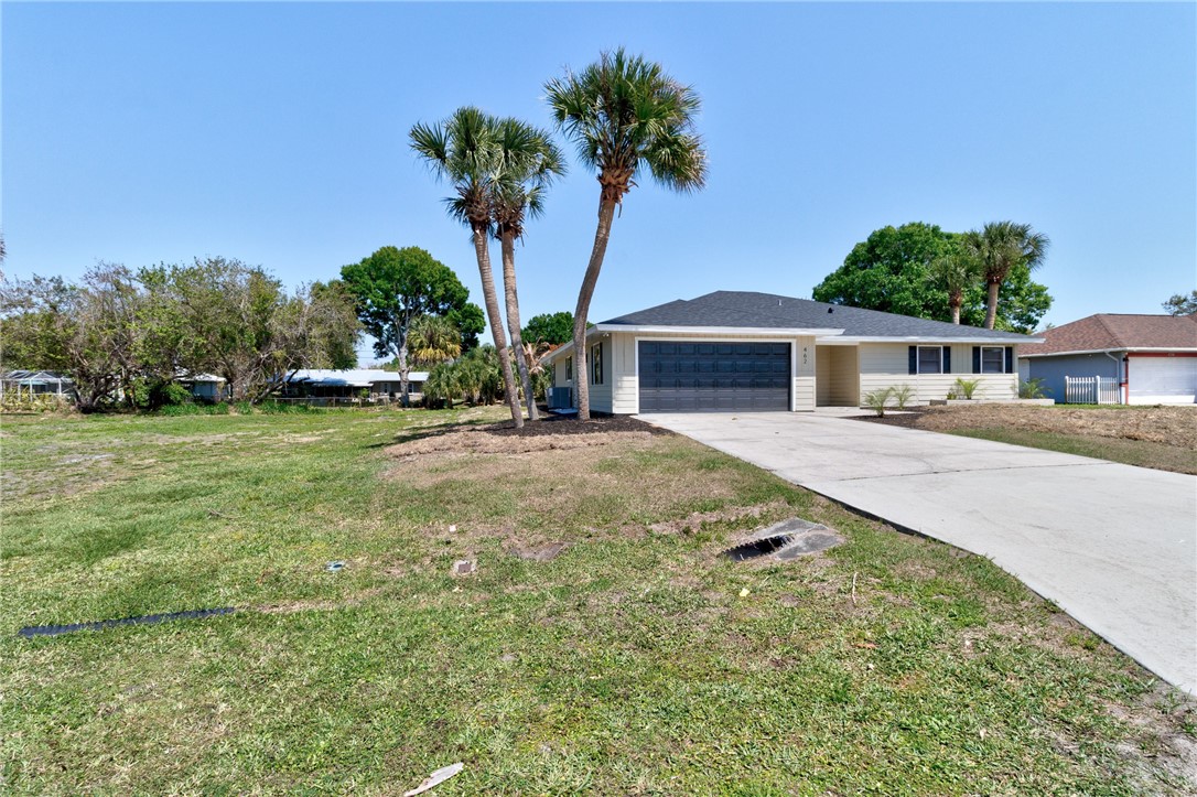 462 Watercrest Street Sebastian, FL 32958 - Photo 4 of 36 a view of a house with a yard