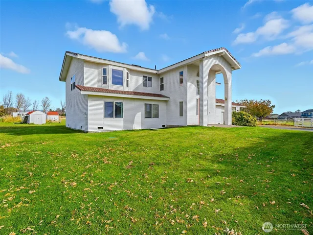 a front view of house with garden