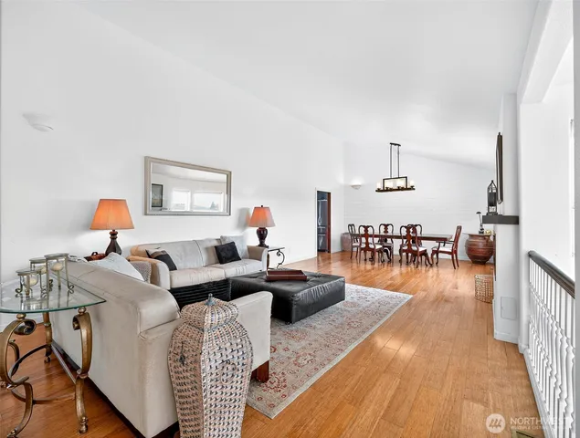 a living room with furniture and a table