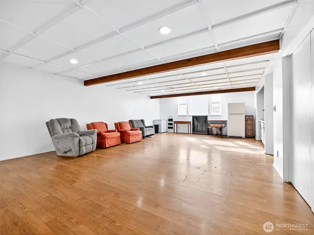 a living room with furniture and a table