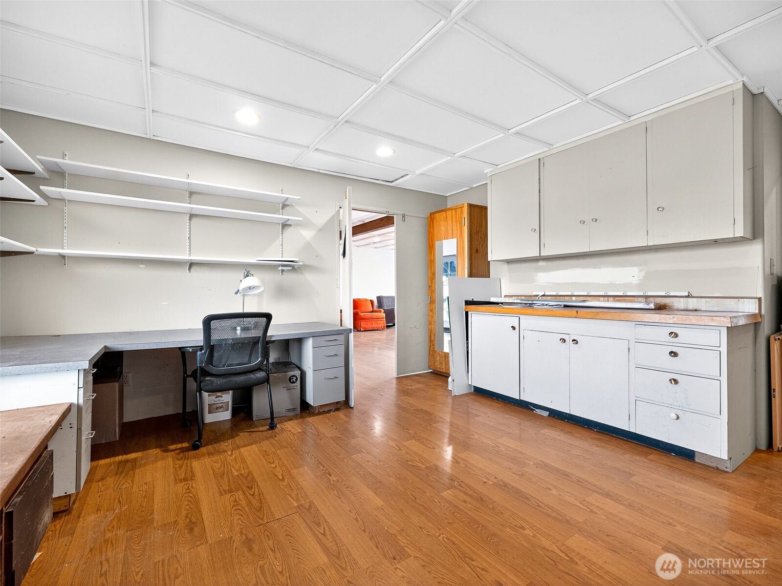 430 Gail Road Ellensburg, WA 98926 - Photo 35 of 40 a kitchen with cabinets wooden floor and a dining table