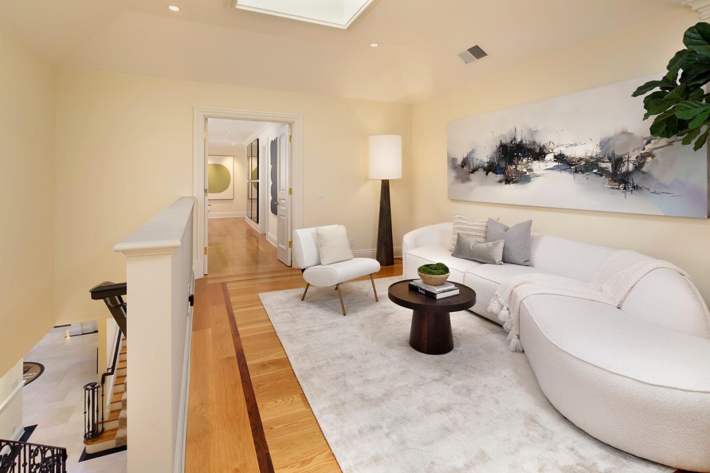 89 Almendral Avenue Atherton, CA 94027 - Photo 12 of 26 a living room with furniture and wooden floor