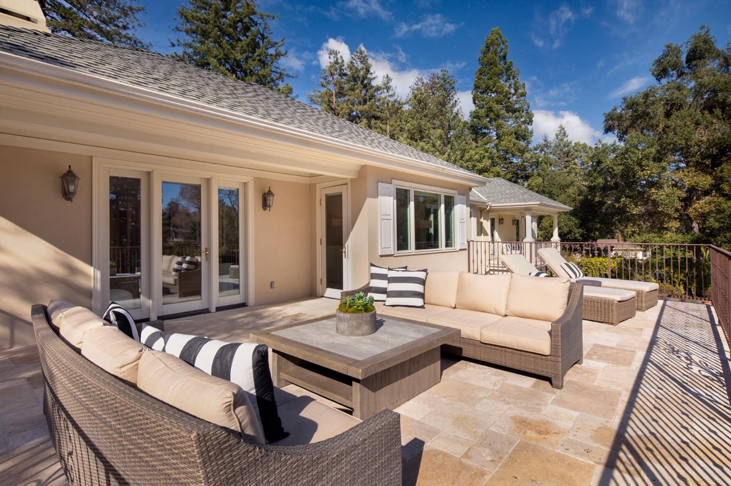 89 Almendral Avenue Atherton, CA 94027 - Photo 15 of 26 a view of a couches in the patio