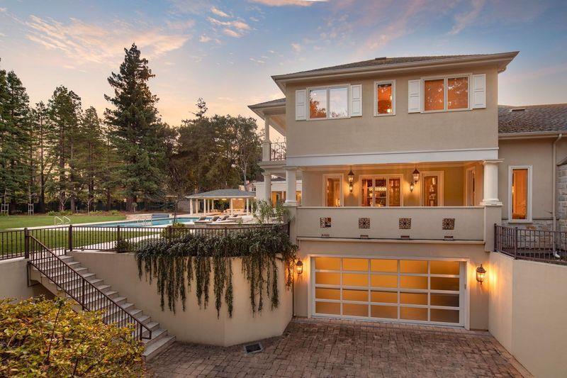 89 Almendral Avenue Atherton, CA 94027 - Photo 23 of 26 a front view of a house with a yard
