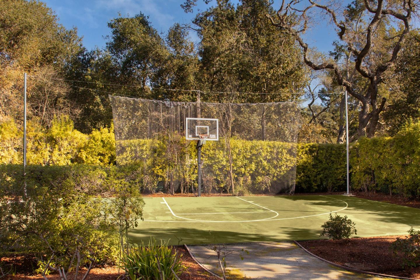 89 Almendral Avenue Atherton, CA 94027 - Photo 25 of 26 a view of a swimming pool with an outdoor space and seating area