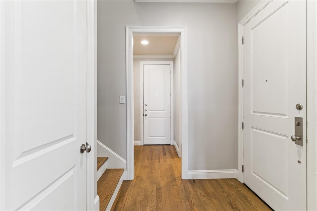 6531 Roper Street Dallas, TX 75209 - Photo 18 of 40 a view of a hallway with wooden floor