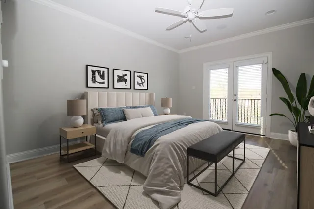 a bedroom with a large bed and a window