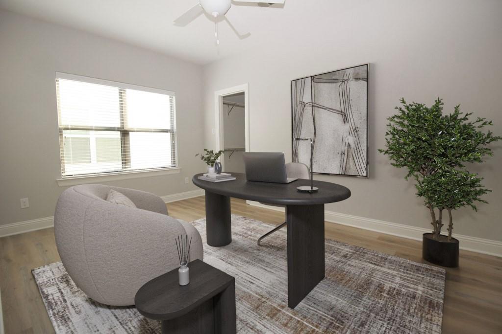 6531 Roper Street Dallas, TX 75209 - Photo 31 of 40 a living room with furniture and a potted plant