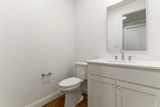 a view of a backyard with a large tree