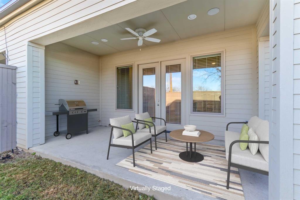 6531 Roper Street Dallas, TX 75209 - Photo 38 of 40 a living room with furniture and wooden floor