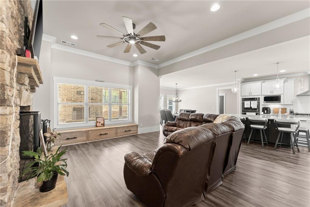 970 GA Highway 211 Winder, GA 30680 - Photo 11 of 60 a living room with furniture and a large window