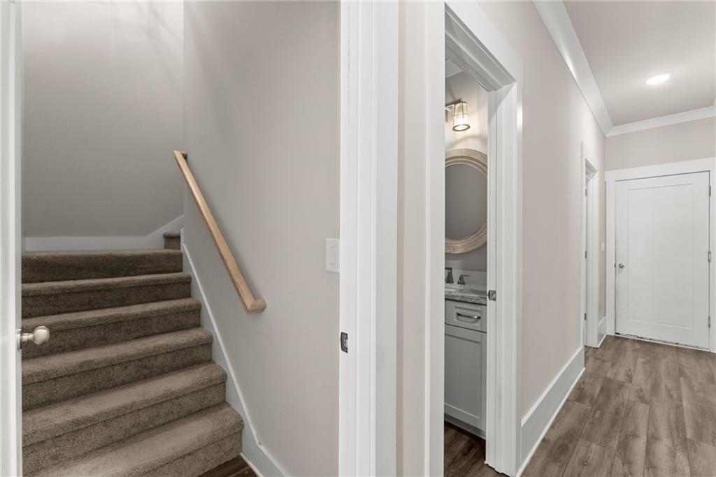 970 GA Highway 211 Winder, GA 30680 - Photo 33 of 60 a view of a hallway with wooden floor and entryway