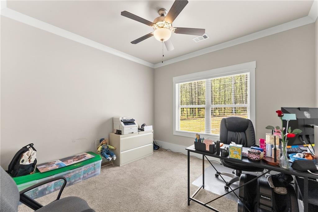 970 GA Highway 211 Winder, GA 30680 - Photo 41 of 60 a workspace with furniture and a window