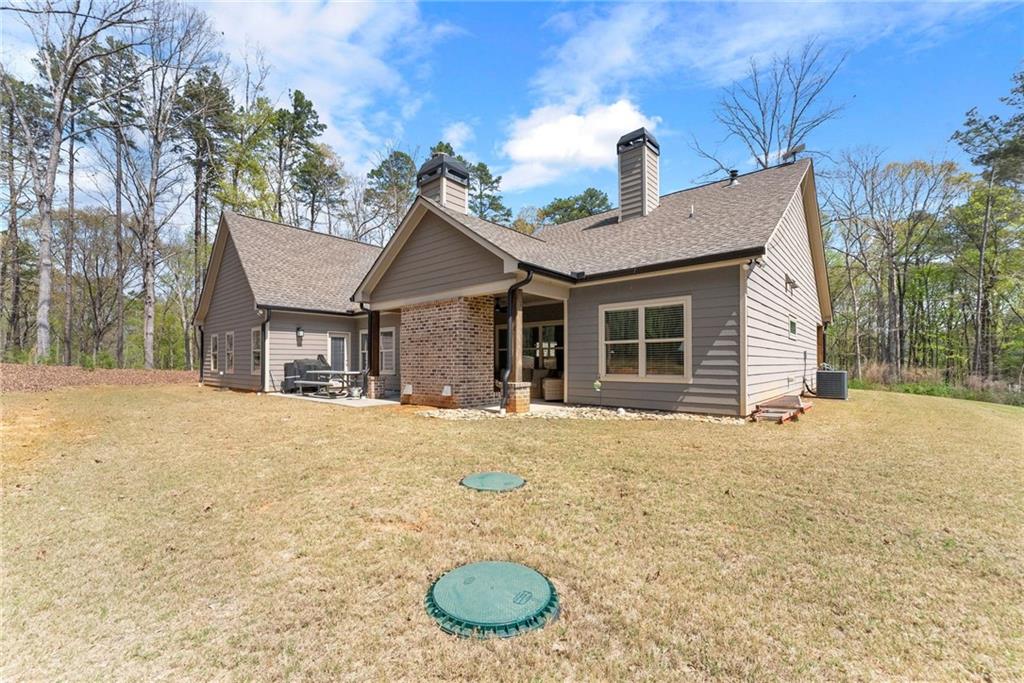 970 GA Highway 211 Winder, GA 30680 - Photo 46 of 60 a house view with a outdoor space