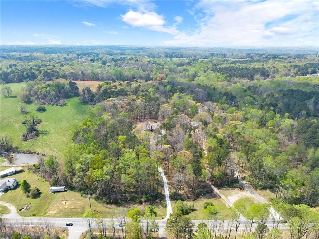 970 GA Highway 211 Winder, GA 30680 - Photo 54 of 60 an aerial view of residential houses with outdoor space and trees