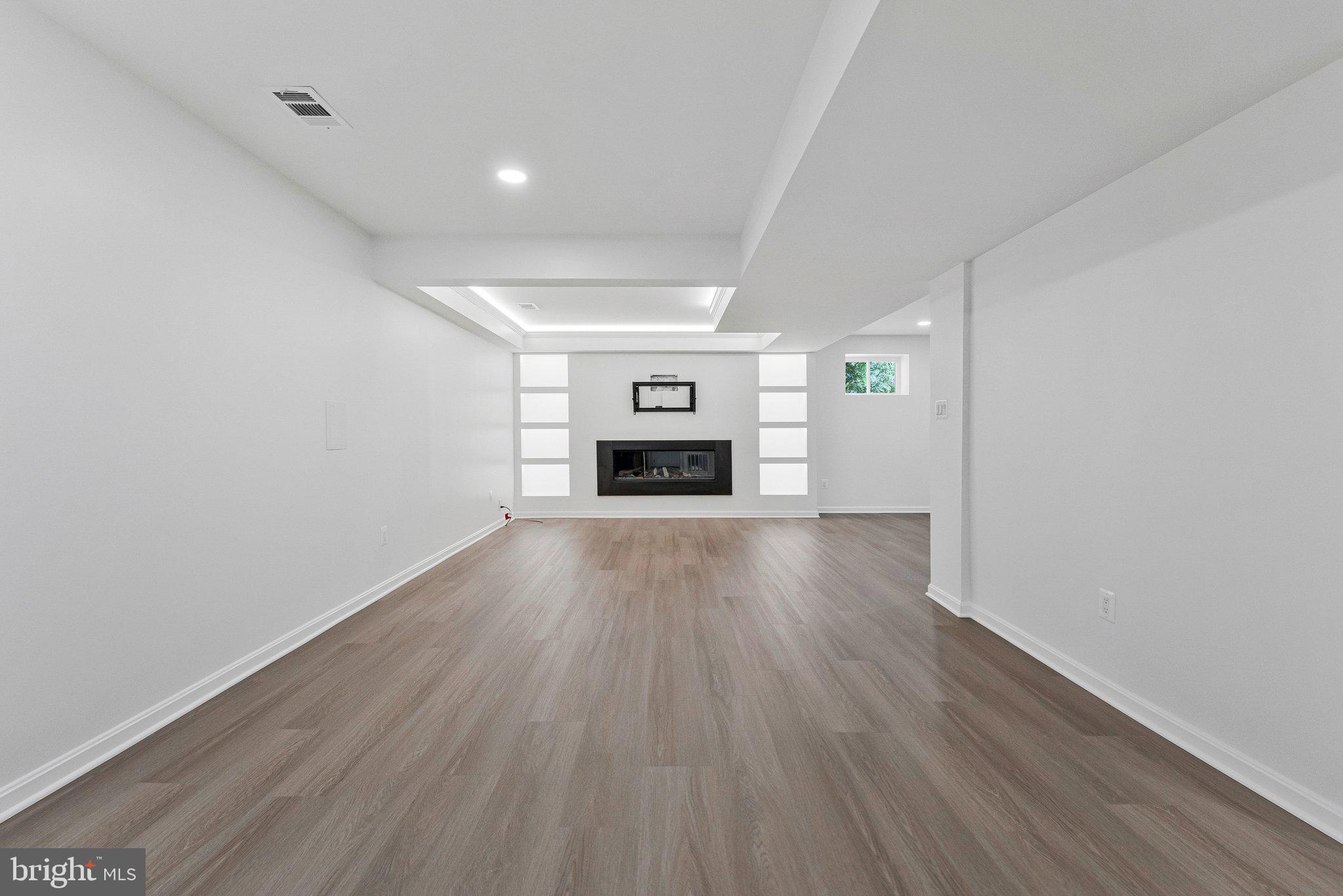 7730 Falstaff Road McLean, VA 22102 - Photo 57 of 83 Family room with fireplace