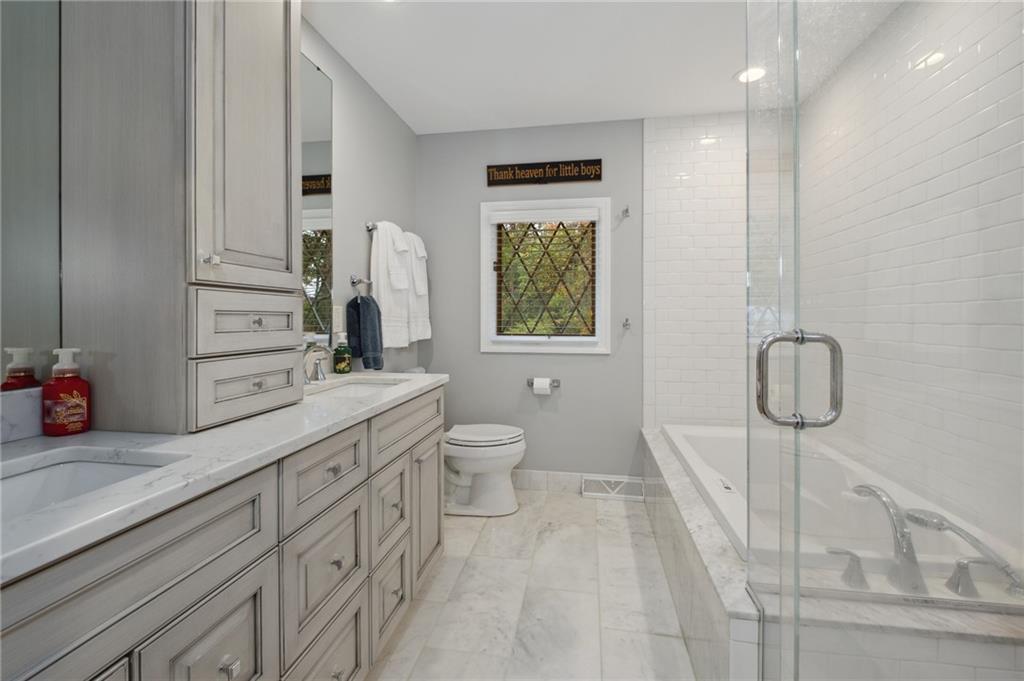 9780 Woodland Road North Pittsburgh, PA 15237 - Photo 29 of 47 Dual Sink Vanity And A Jetted Tub In The Hall Bathroom