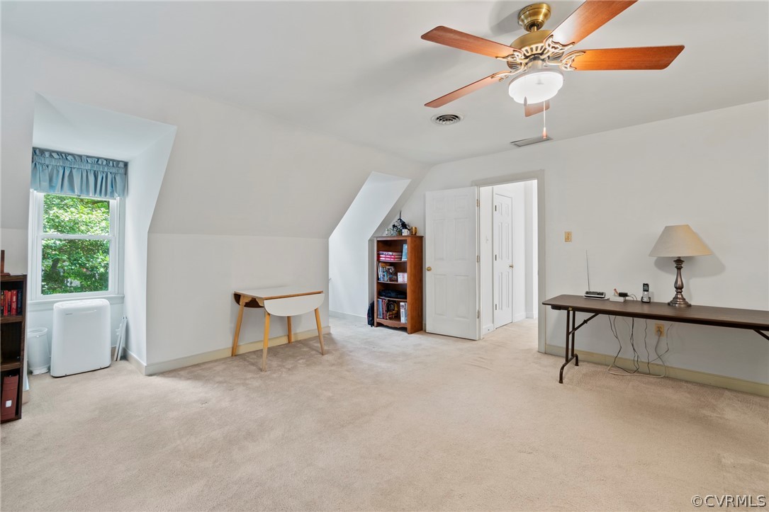 13903 Beechwood Point Road Midlothian, VA 23112 - Photo 27 of 33 a view of a livingroom with furniture and a ceiling fan
