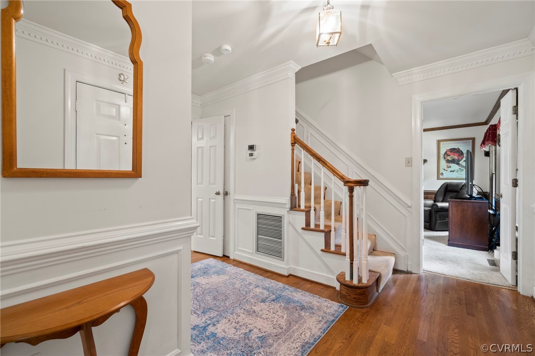 13903 Beechwood Point Road Midlothian, VA 23112 - Photo 3 of 33 a view of an entryway with wooden floor