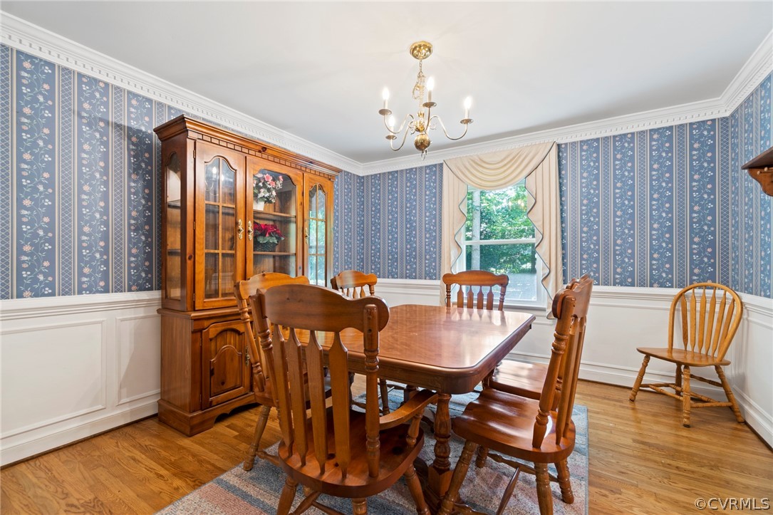 13903 Beechwood Point Road Midlothian, VA 23112 - Photo 6 of 33 a view of a dining room with furniture window and wooden floor
