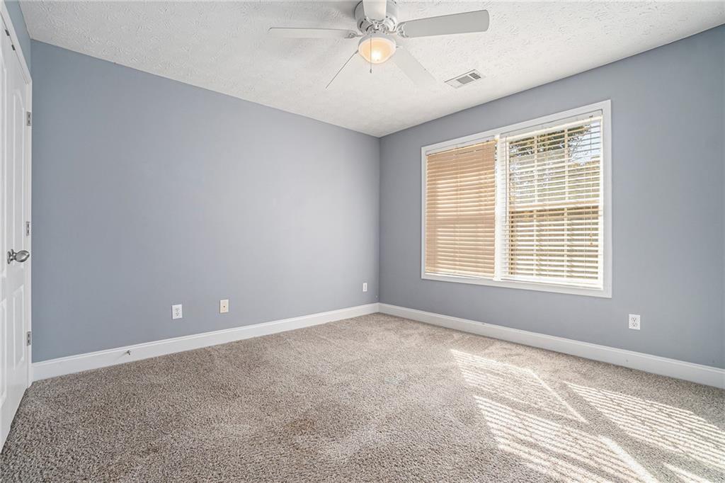 21 Cartee Lane Dallas, GA 30157 - Photo 16 of 29 a view of an empty room with a window
