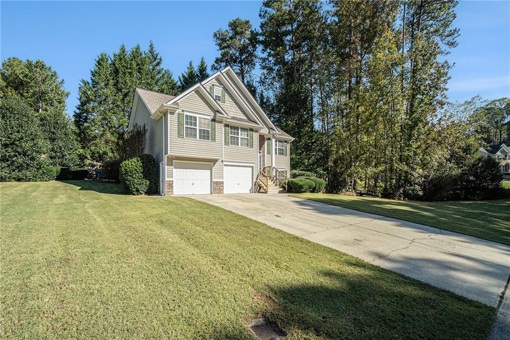 21 Cartee Lane Dallas, GA 30157 - Photo 2 of 29 a front view of a house with a yard