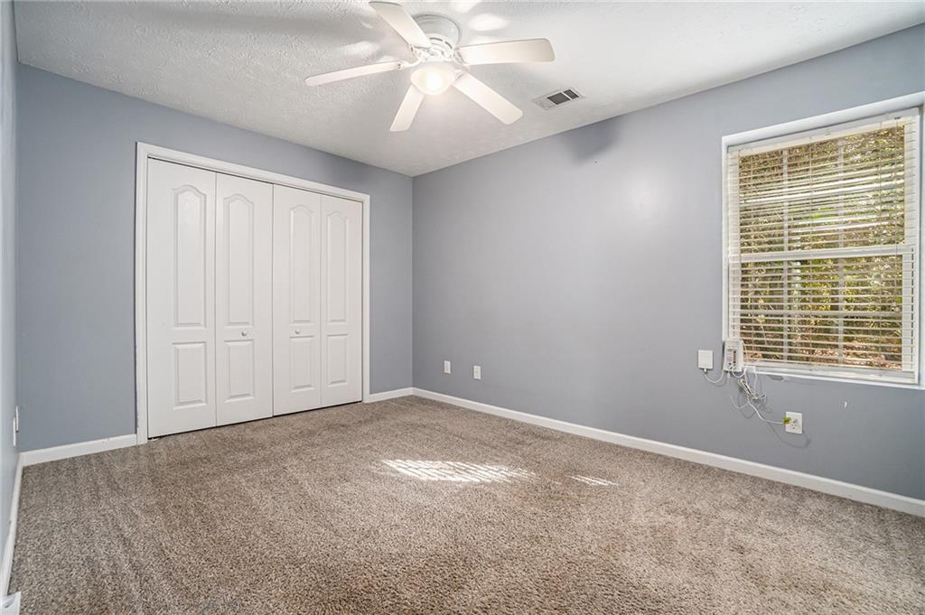 21 Cartee Lane Dallas, GA 30157 - Photo 24 of 29 a view of an empty room with a window