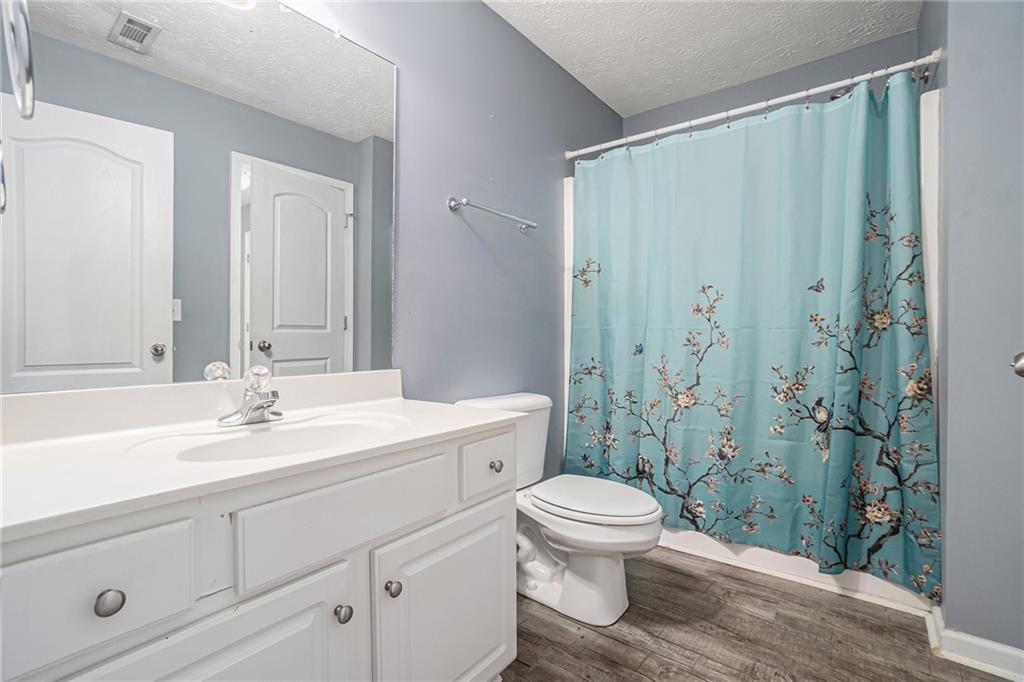 21 Cartee Lane Dallas, GA 30157 - Photo 25 of 29 a bathroom with a sink and a mirror
