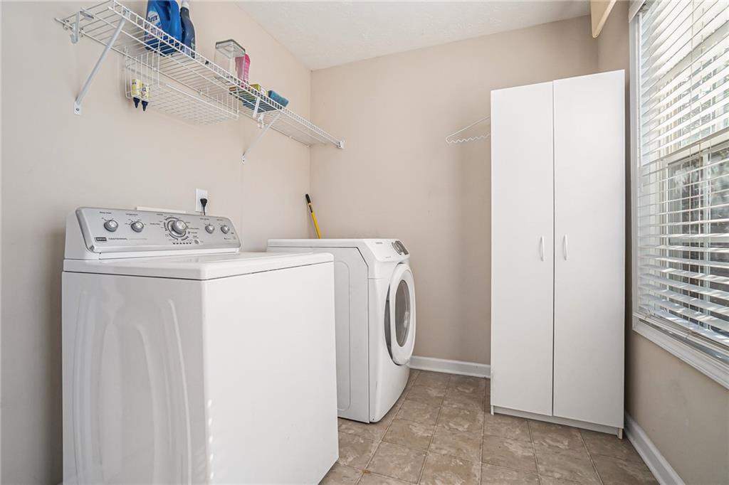 21 Cartee Lane Dallas, GA 30157 - Photo 26 of 29 a utility room with dryer and washer