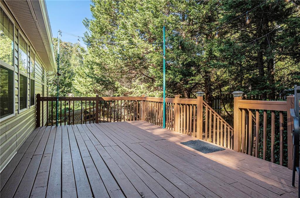 21 Cartee Lane Dallas, GA 30157 - Photo 27 of 29 a view of deck with wooden floor and fence