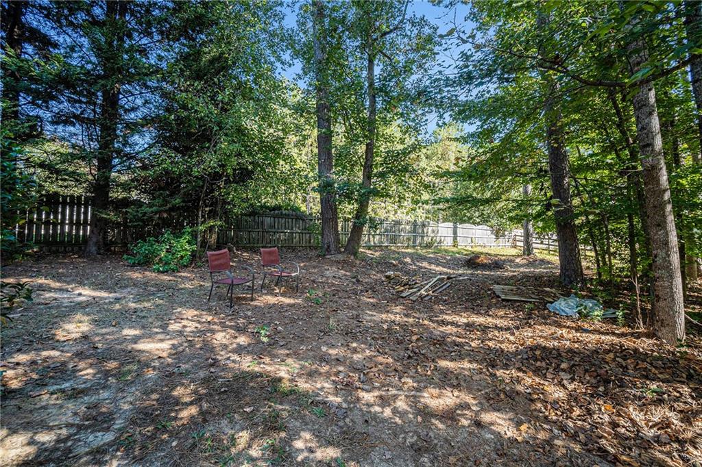 21 Cartee Lane Dallas, GA 30157 - Photo 29 of 29 a view of a forest with trees in the background
