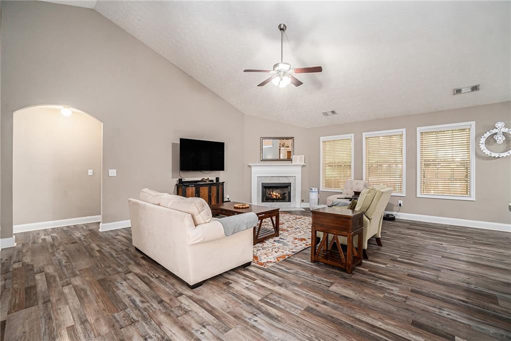 21 Cartee Lane Dallas, GA 30157 - Photo 4 of 29 a living room with furniture and a flat screen tv