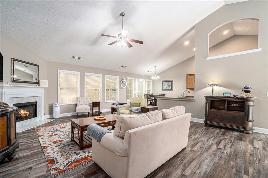 21 Cartee Lane Dallas, GA 30157 - Photo 5 of 29 a living room with furniture fireplace and a large window