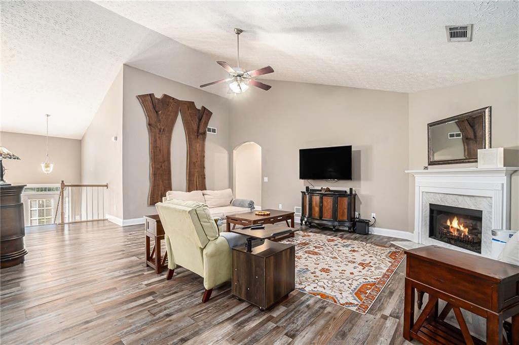 21 Cartee Lane Dallas, GA 30157 - Photo 6 of 29 a living room with furniture fireplace and flat screen tv