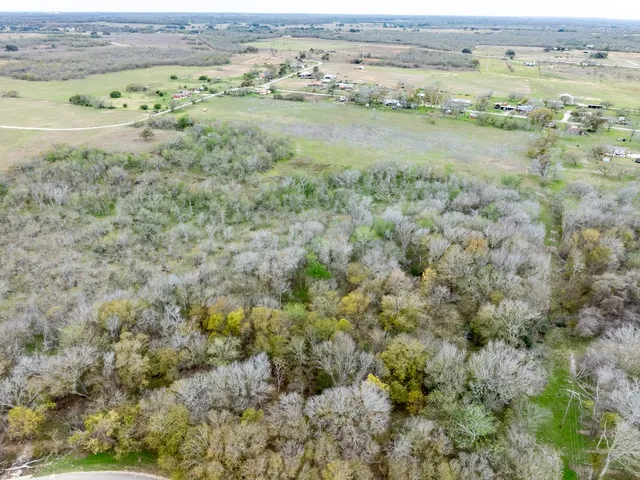 a view of beach and an ocean