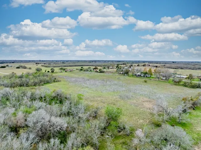 a view of a city with lots of trees