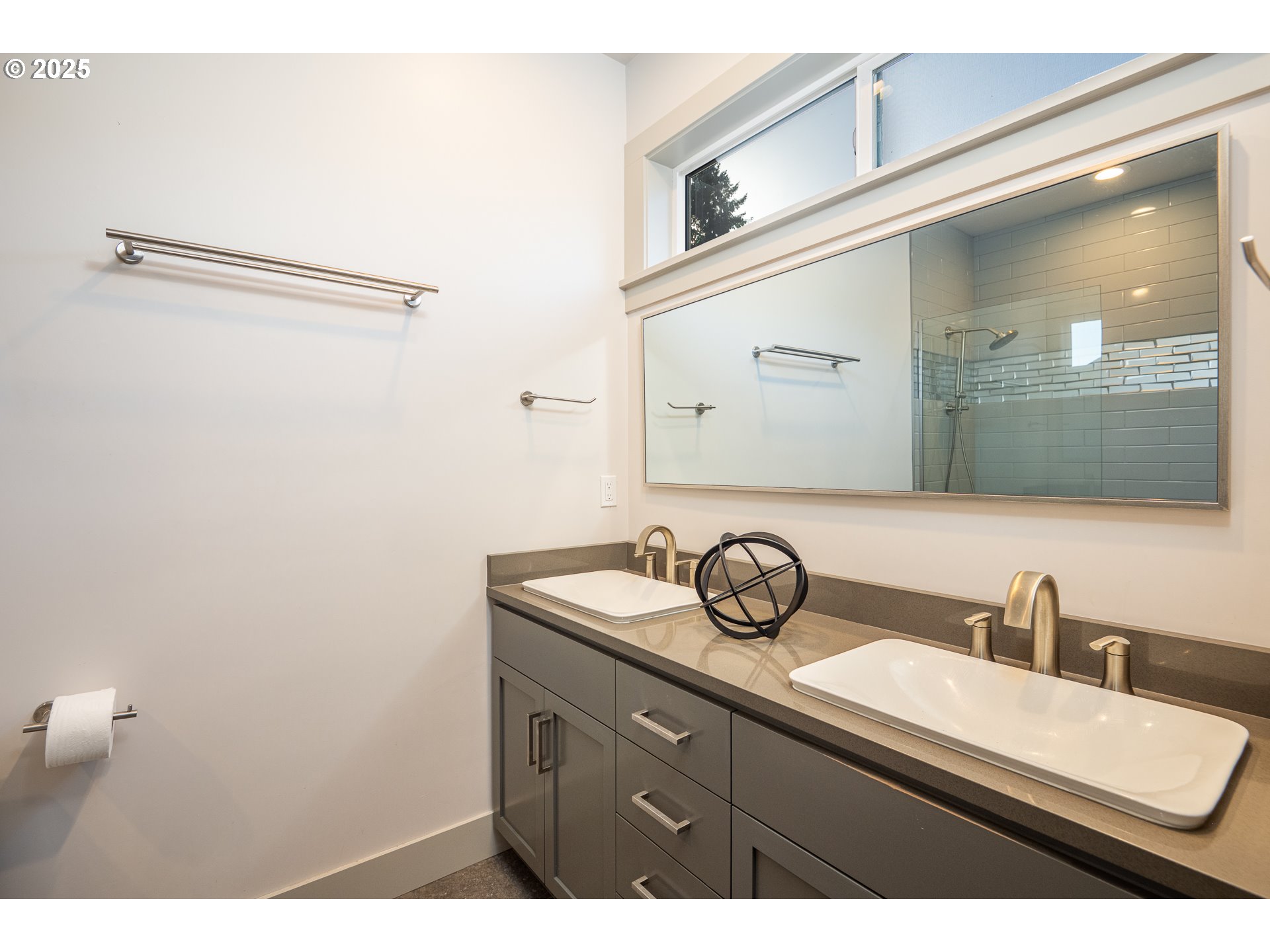 3352 Zane Lane Eugene, OR 97404 - Photo 17 of 42 a bathroom with a sink and a mirror