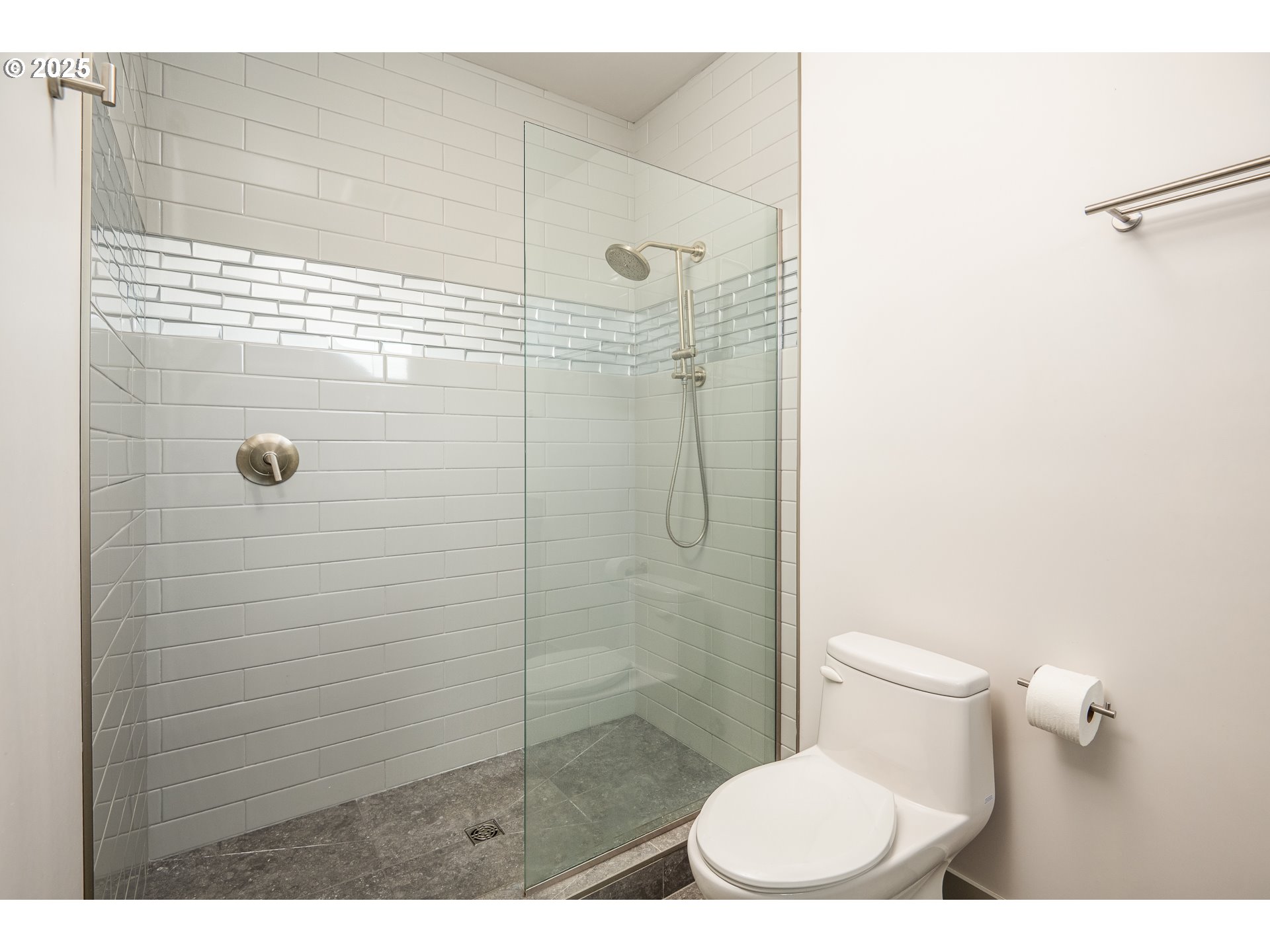 3352 Zane Lane Eugene, OR 97404 - Photo 18 of 42 a bathroom with a toilet and a shower