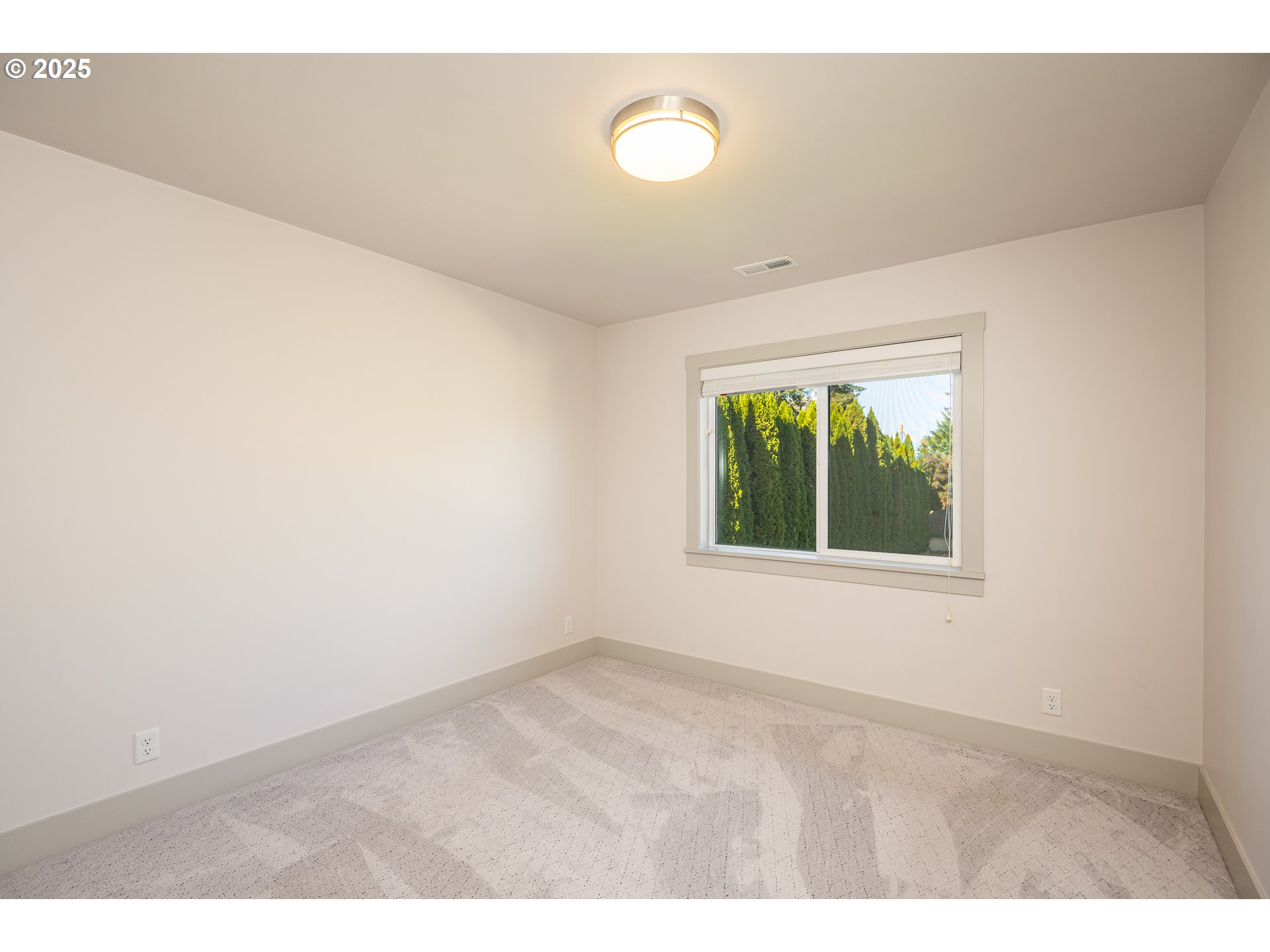 3352 Zane Lane Eugene, OR 97404 - Photo 21 of 42 a view of an empty room with a window