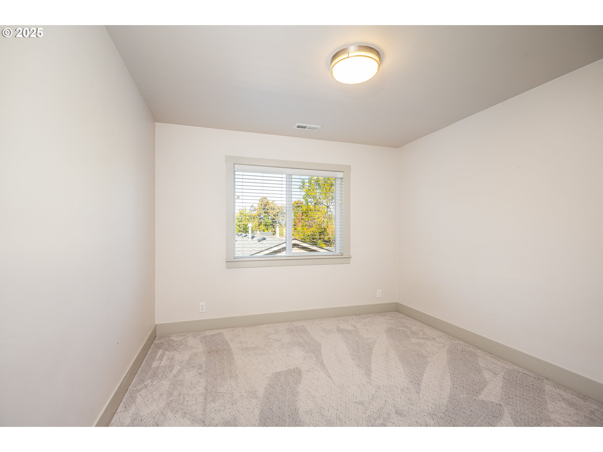 3352 Zane Lane Eugene, OR 97404 - Photo 25 of 42 a view of an empty room with a window