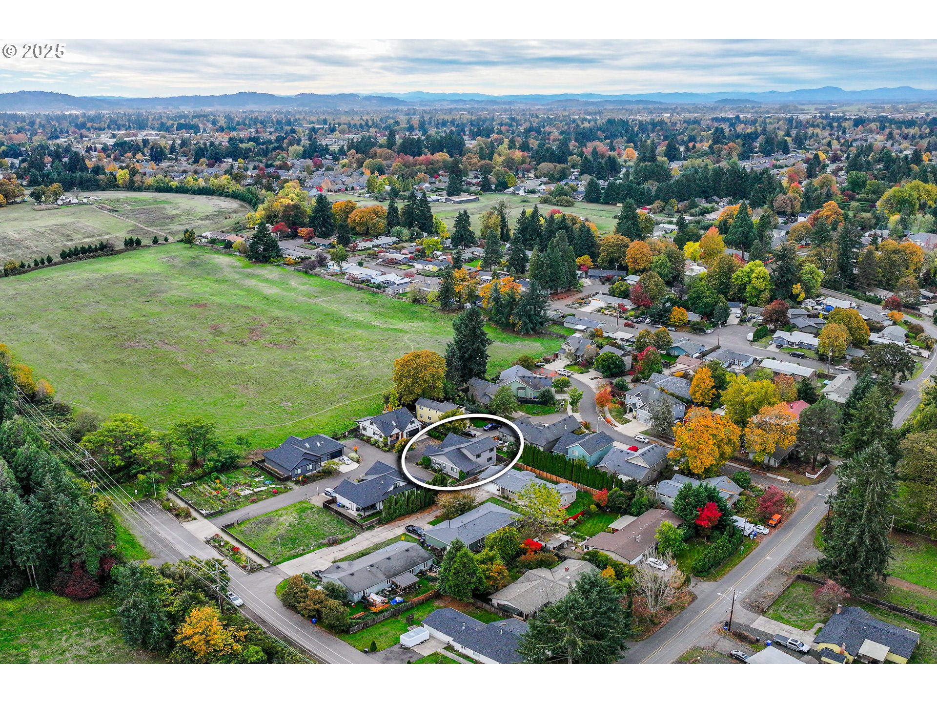 3352 Zane Lane Eugene, OR 97404 - Photo 32 of 42 an aerial view of a house with garden space and ocean view
